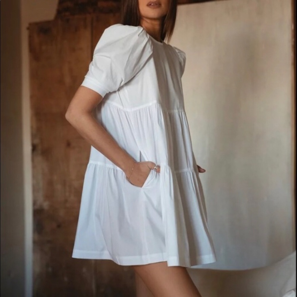 Danielle Bernstein white baby doll tiered dress